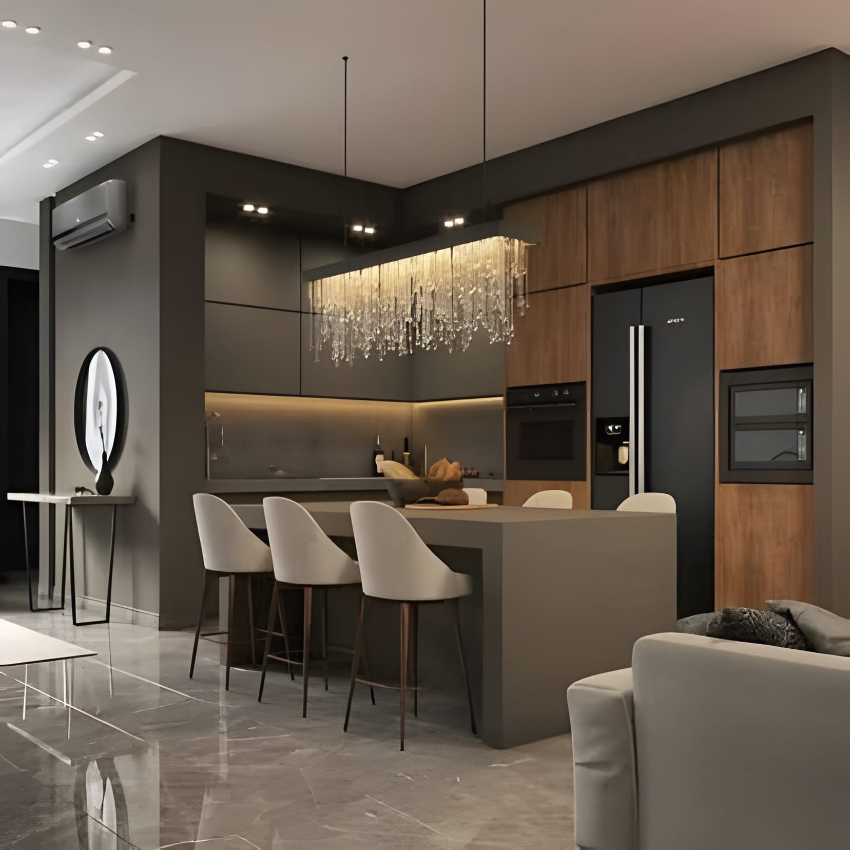 A dark kitchen bar under a cascade of crystal pendants, taupe stools pulled up to the counter.