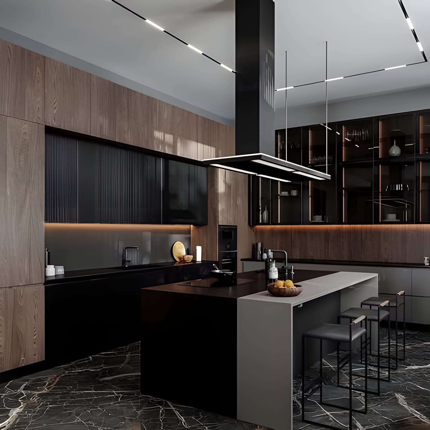 Black cabinetry warmed by walnut panels, an island floating on dark marble floors.