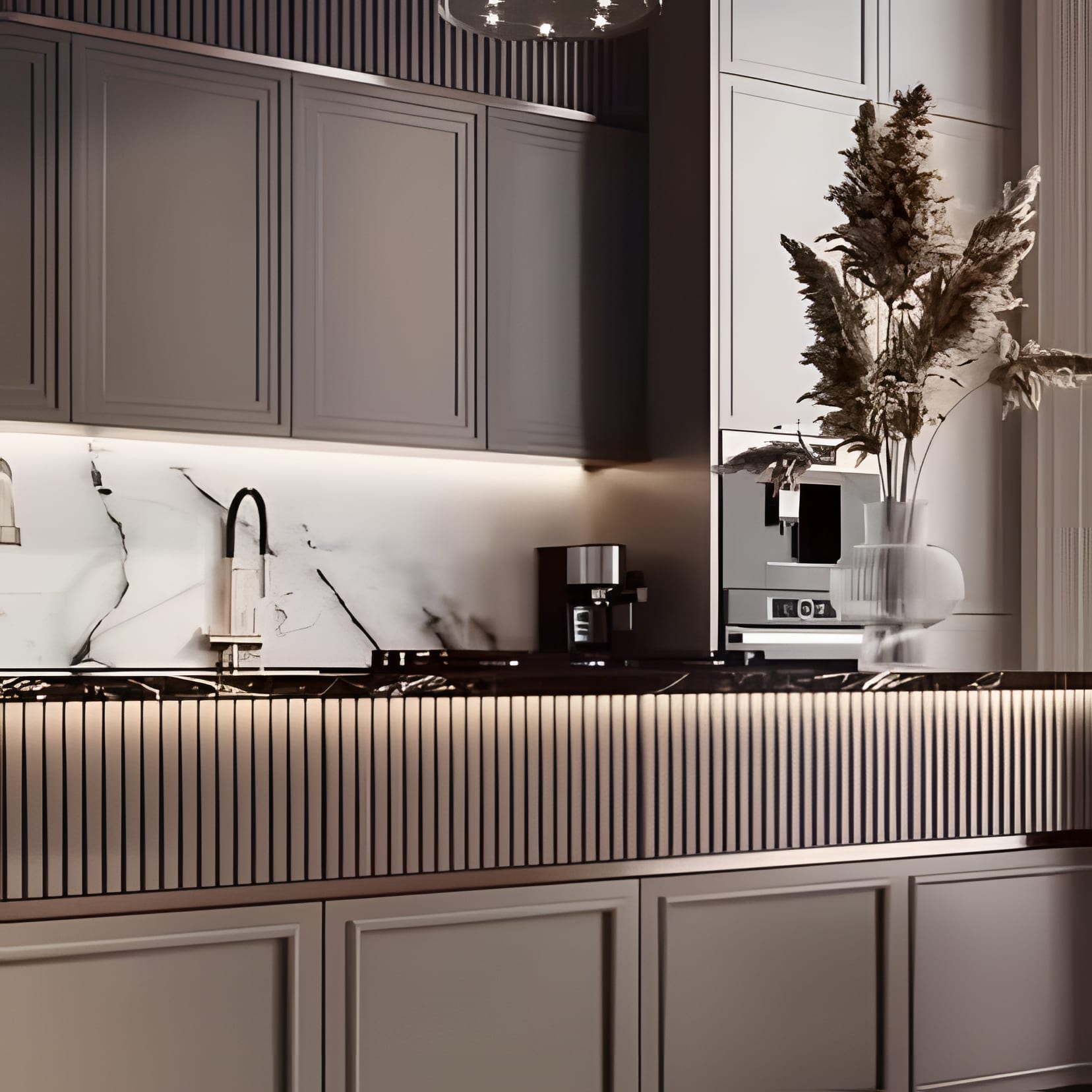 Grey panelled cabinets and a white marble backsplash, the coffee machine already working.